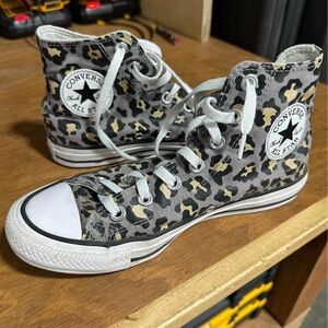 Women’s Converse high tops, size 7.